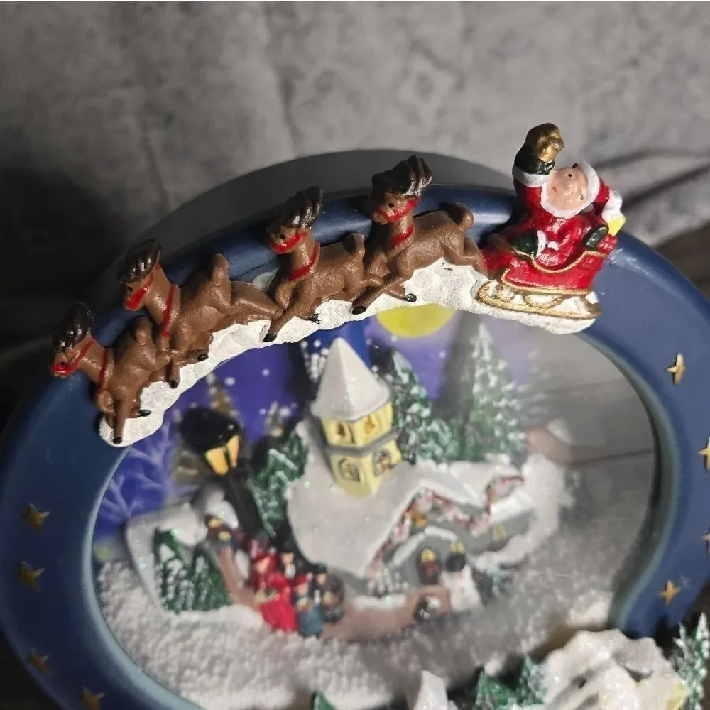 Two snow globes, animated snow, one is musical  and lights up htf